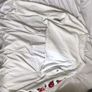 white cropped sweater with roses down sleeve